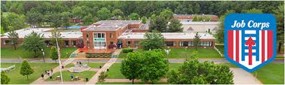 Bird's-eye View of the Woodland Job Corps Campus along with the Logo of a Red, White and Blue Shi