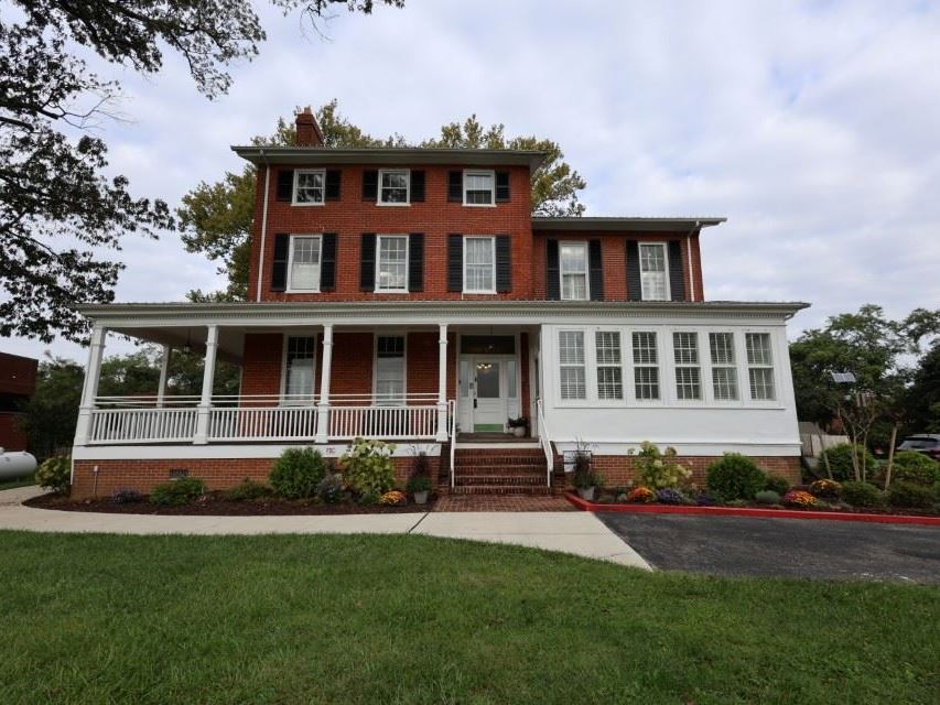 A picture of the front of Gude Mansion