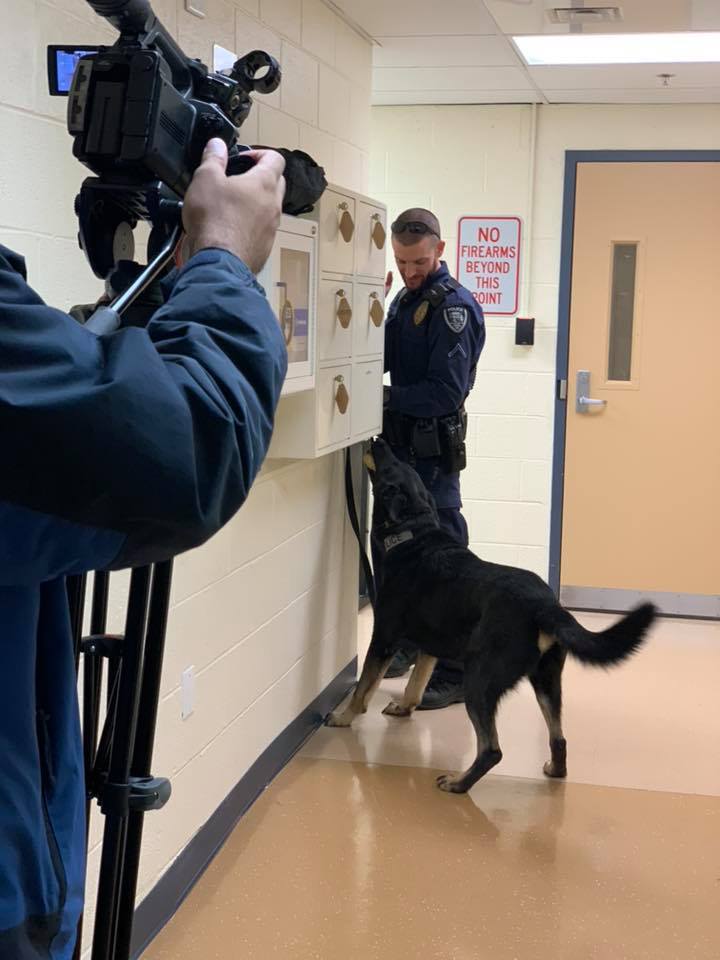 Police Officer and a Dog