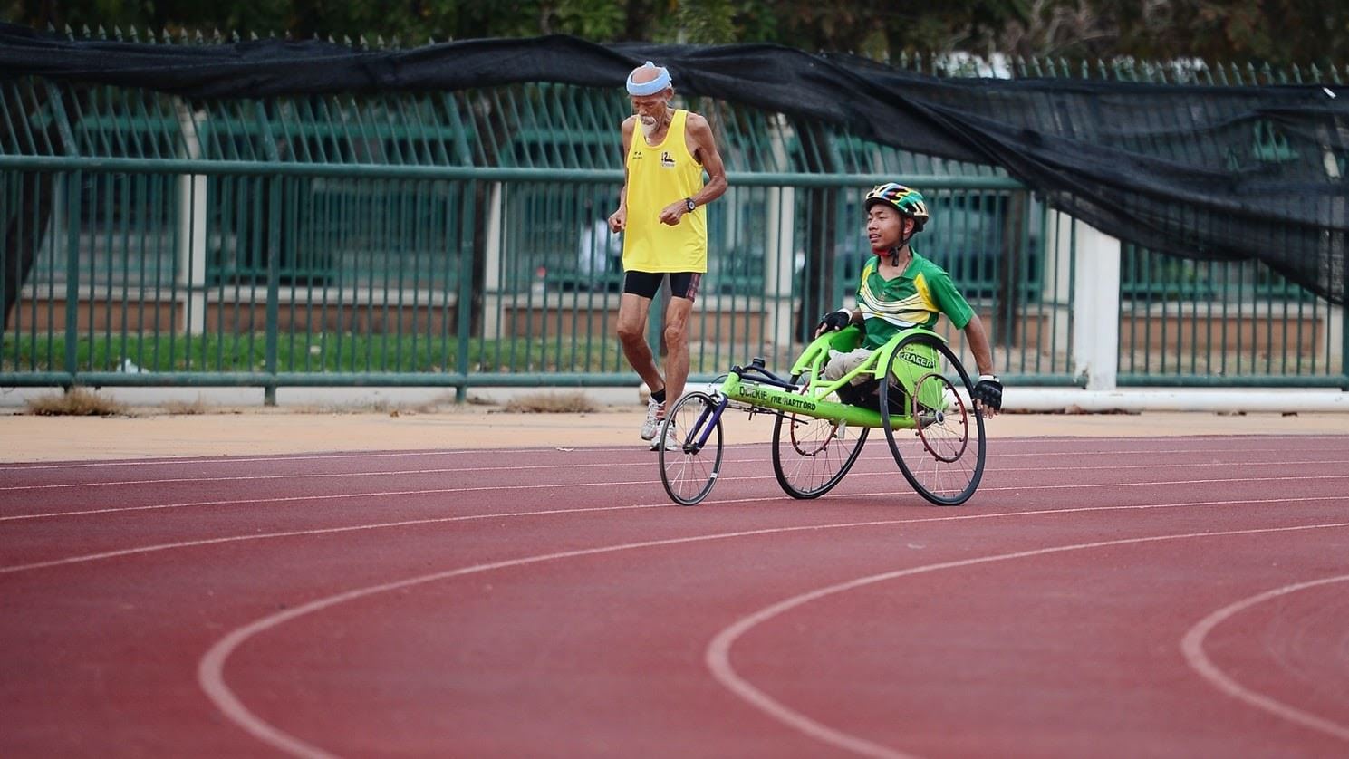Disabled Athletes going around running track
